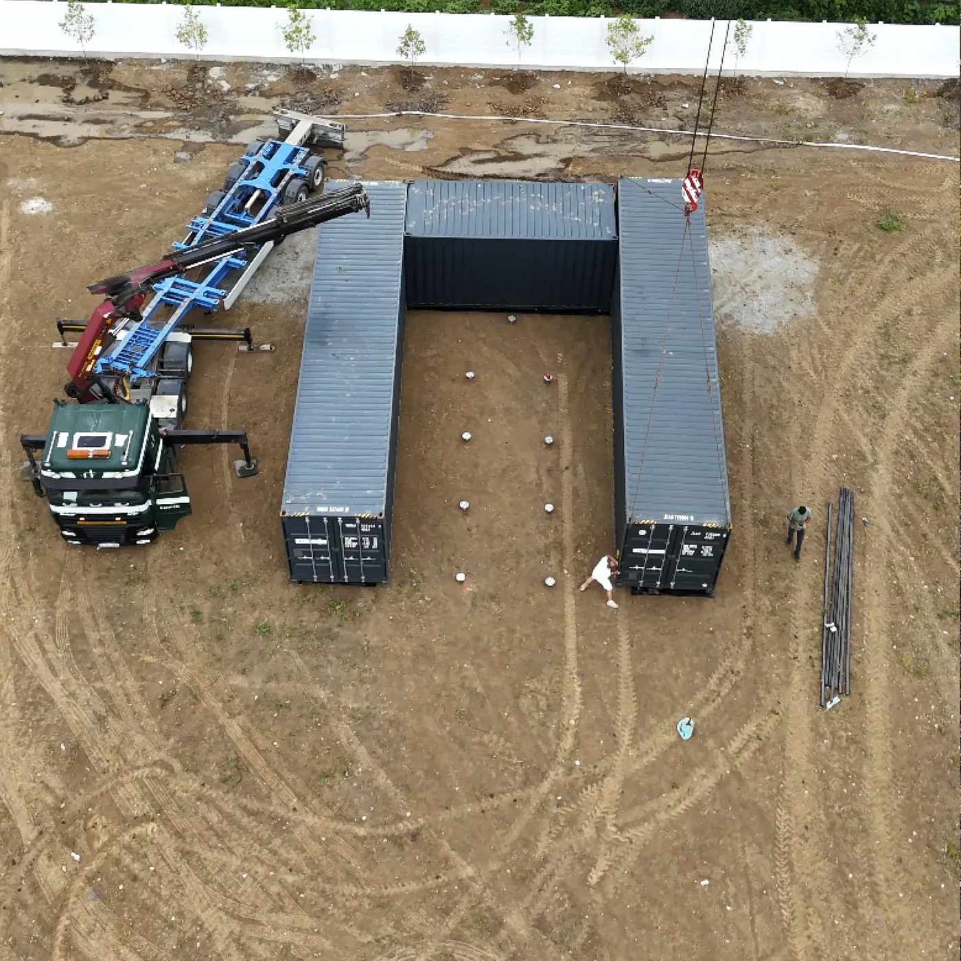 Shipping containers installed on MARTETIC screw foundations in Cernica